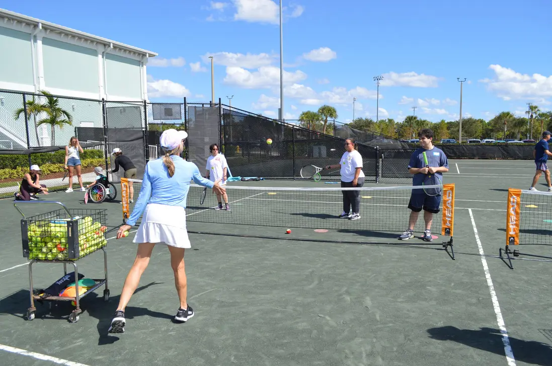 Group of youth at tennis event